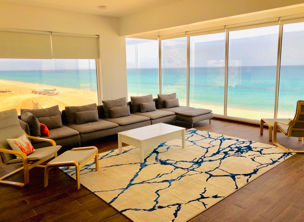 Casa del Mar living room with floor-to-ceiling sea views